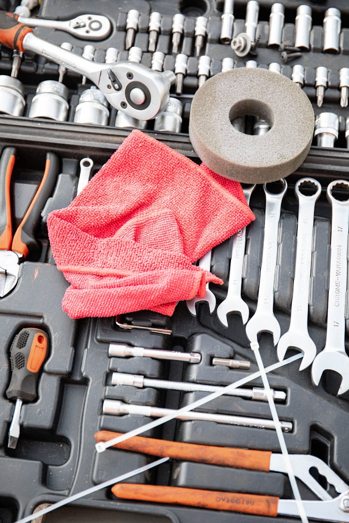 Crafting Captivating Headlines: Your awesome post title goes here Close-up view of a versatile toolkit featuring wrenches, sockets, and a red cloth for maintenance needs.